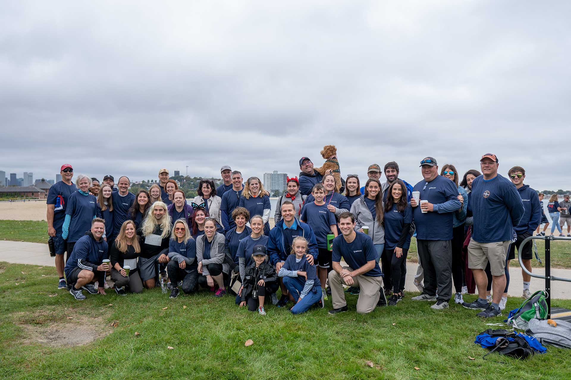 Group photo of Amylyx team smiling outdoors standing together