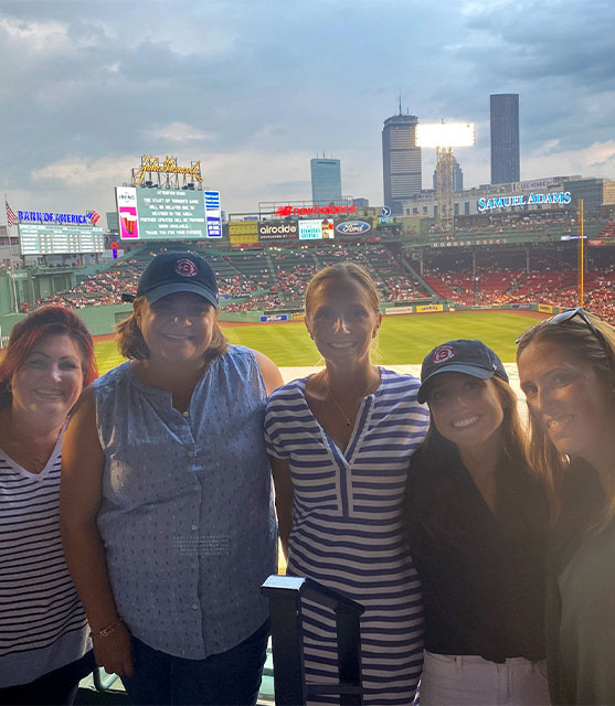 Group photo of Amylyx team members standing at the Red Sox Stadium